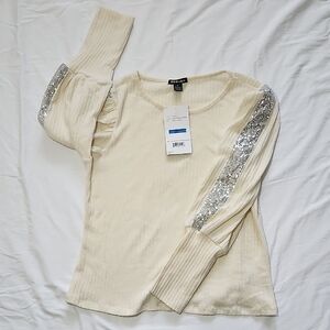 Elegant Cream Long Sleeve Top with Silver Accents